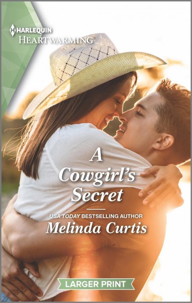 A cowgirl's secret / Melinda Curtis.